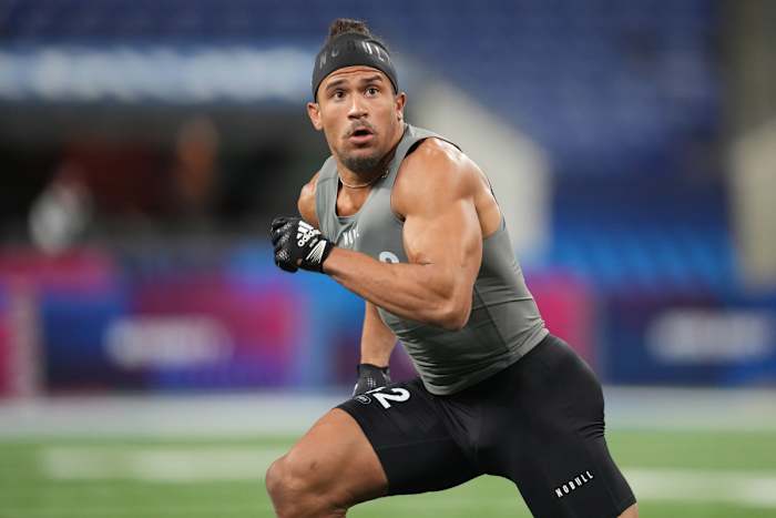Illinois safety Sydney Brown runs through drills at the 2023 NFL Combine